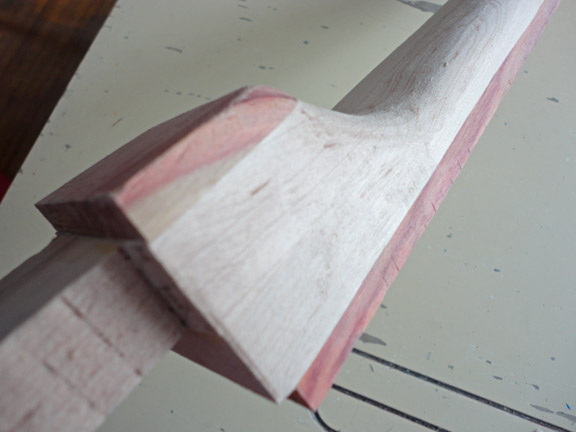 Both the fingerboard and the heel are bloodwood.