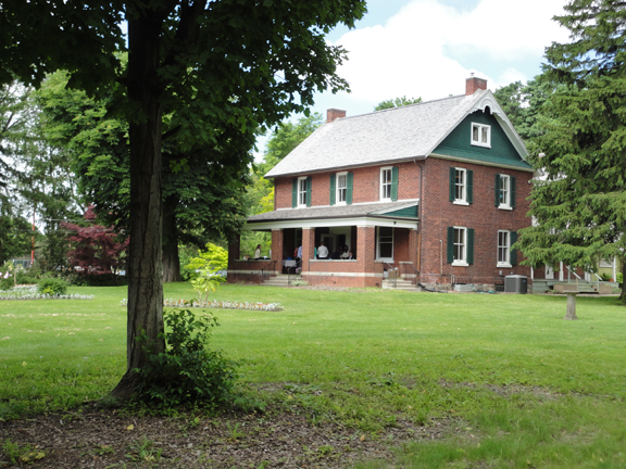 June 2014 - Here's what the farmhouse looks like today. The family deeded the home, original barn, and farm buildings along with a large plot of land. Green acres!  