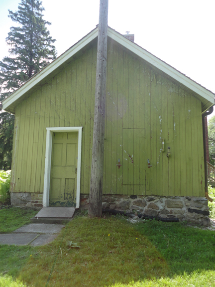 For all of you wanting to see the back of the Cornell-Campbell farm... here it is!  Great old door, and smoky olive paint.  