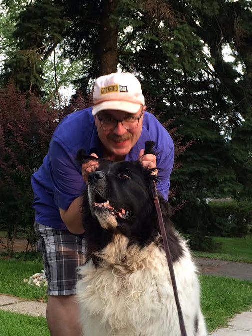 Euegne holding Mem's ears Aug 1 2014